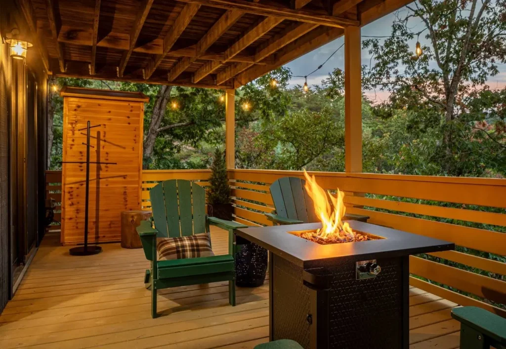 Covered deck with fire table at a Bryce Resort, Virginia vacation rental