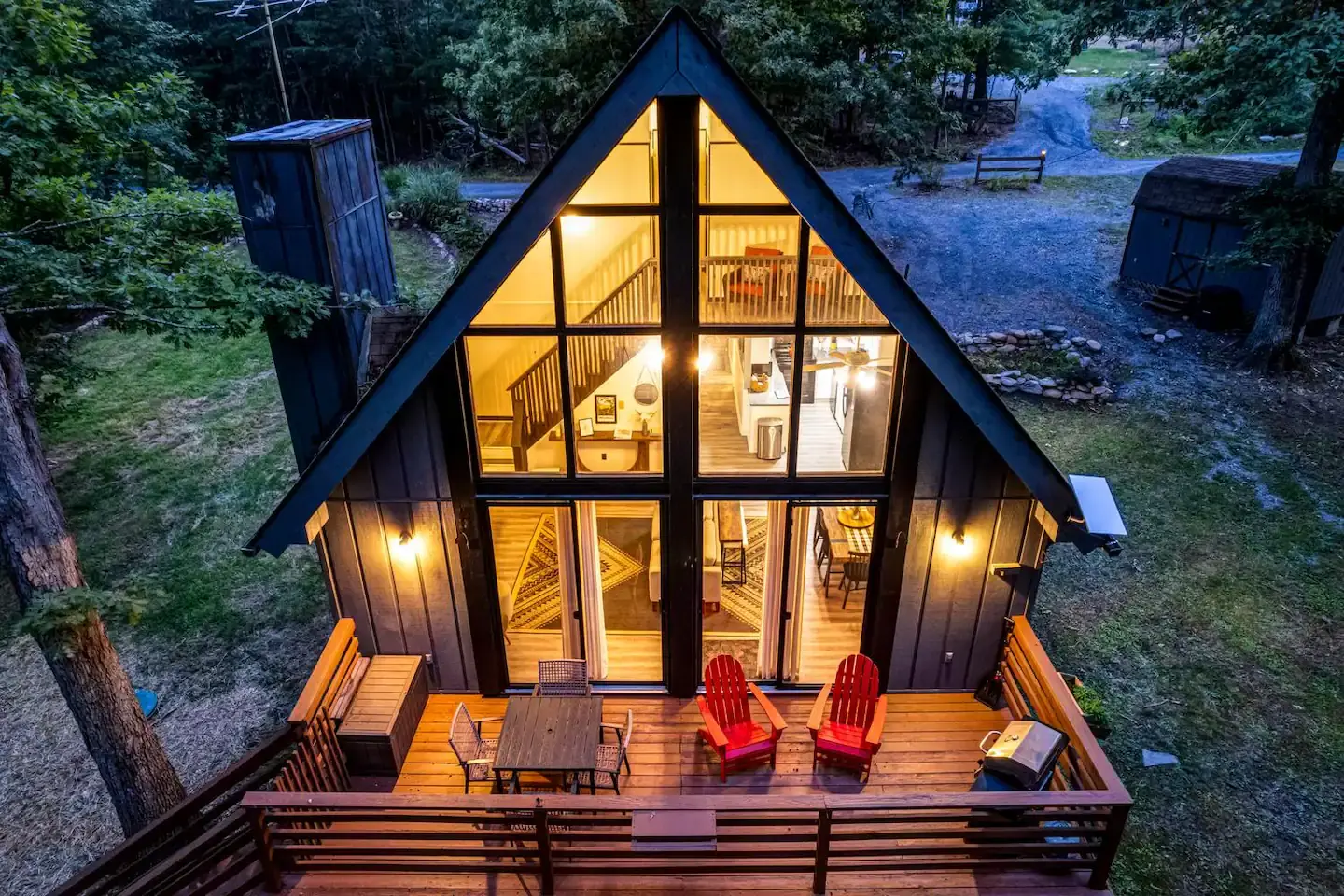 A-frame Airbnb rental lit at dusk in Page County, Virginia