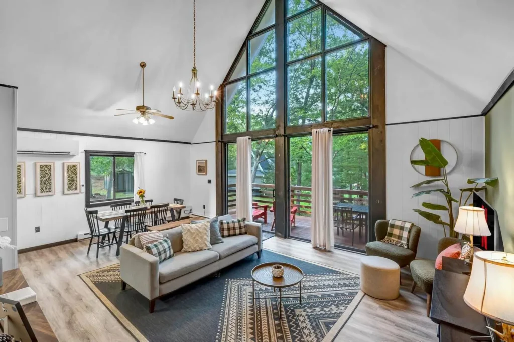 A-frame living area with tall windows at a Page County, Virginia cabin rental