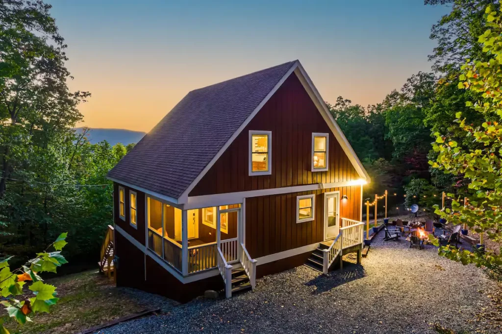 Vacation rental home with fire pit at dusk in Shenandoah, Virginia